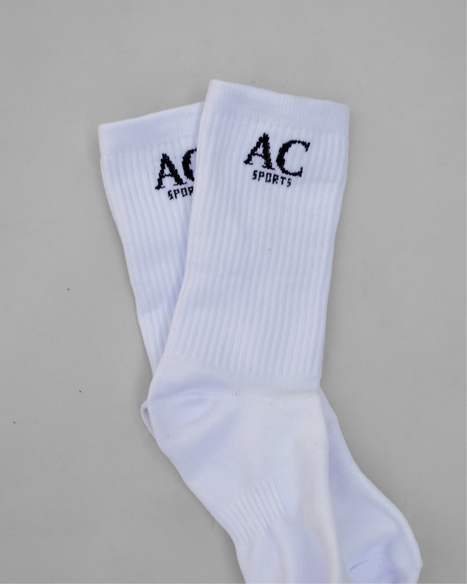 Calcetas deportivas AC Sports de diseño básico y ajuste cómodo, ideales para entrenamiento y uso diario.